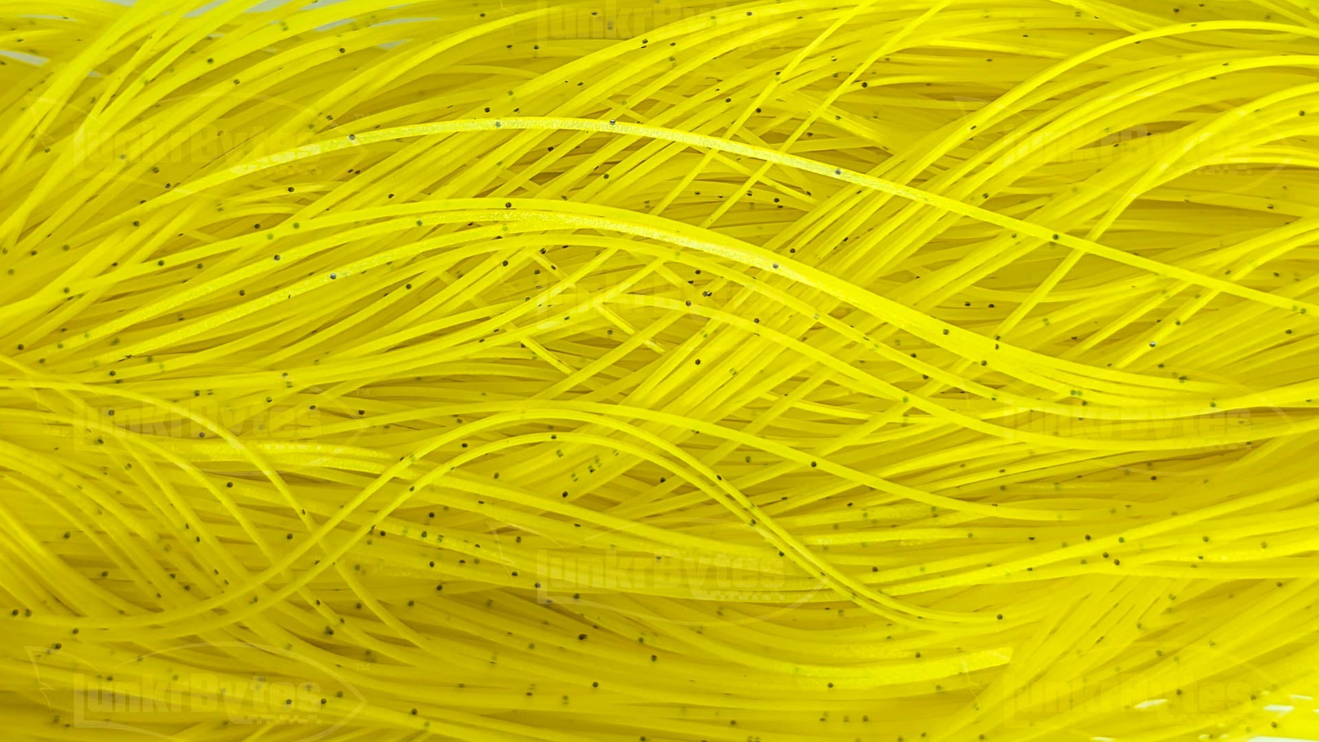 Yellow / Black Flake Silicone Skirt Tab with Flake – Reaction Strike Trigger for Bass (8801-265) Component Silicone Skirt Tab (8801-265)