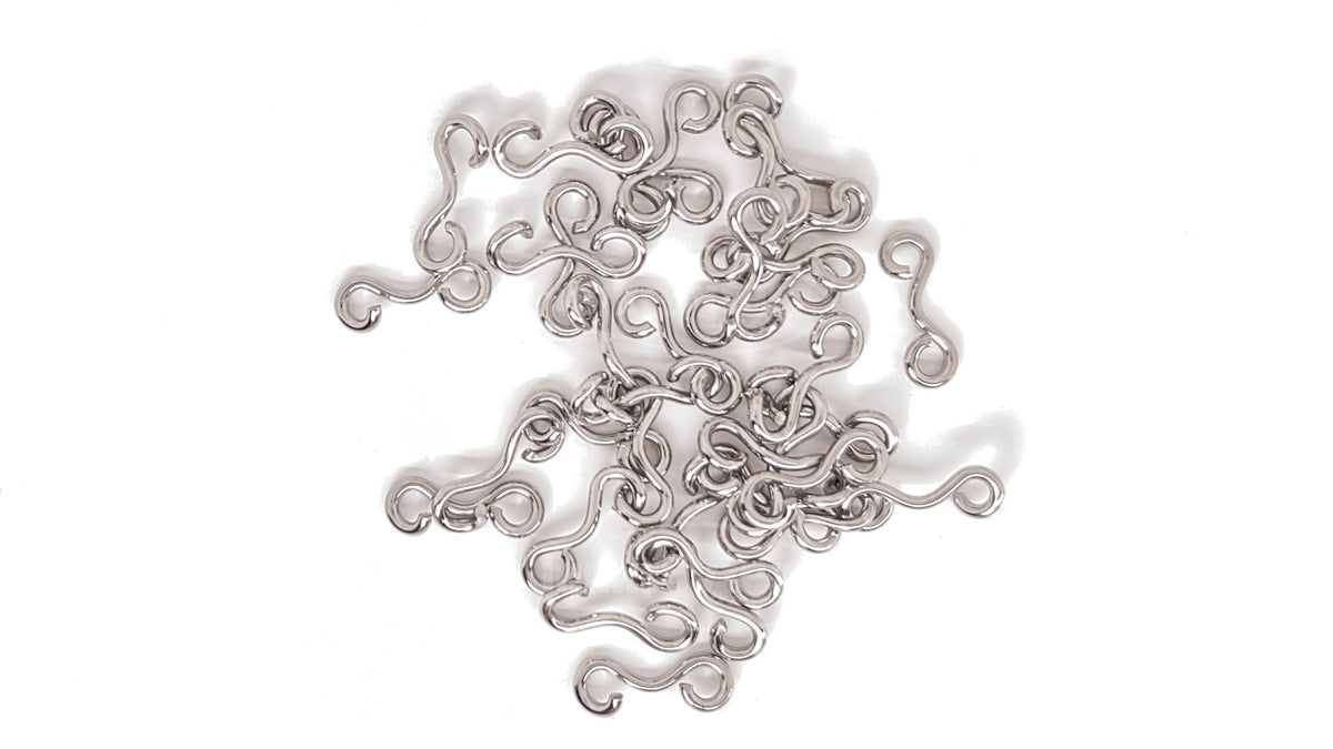 Pile of TorsiArc™ #2 Connectors (LB-TorsiArc-2) in 304 stainless steel